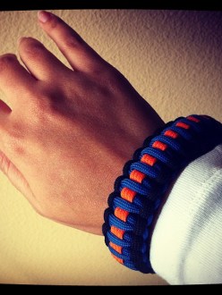 Woven bracelet that the Oak Creek Police Department had specially made for their officers to remember the shooting at the Oak Creek Gurdwara, including orange for the Sikh community, blue for the police officers, and black for those that were lost that day. (source: Sikh Coalition)