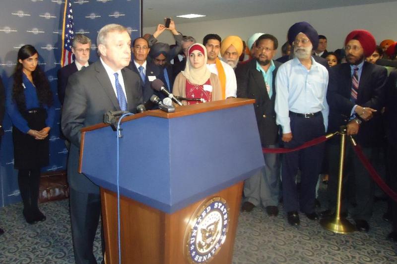 Senator Dick Durbin speaks at a press conference alongside representatives of a variety of groups at the Senate hearing on hate crimes and domestic terrorism last September (photo credit: Dosti.com)