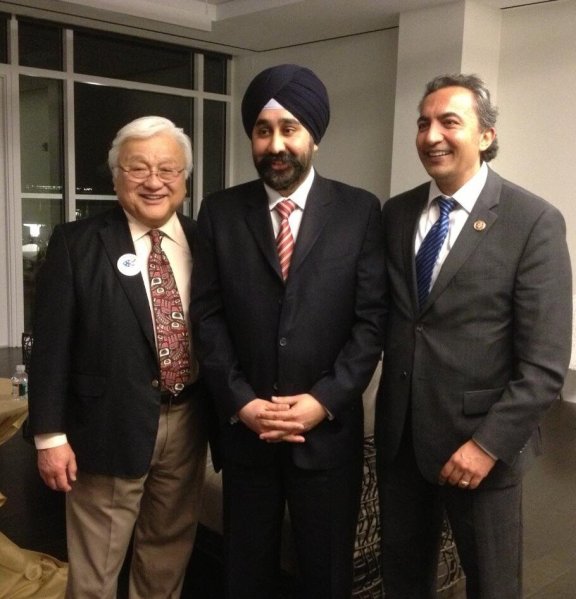 Ravinder Singh Bhalla (center) with Congress Members Mike Honda (left) and Ami Bera (right) at a fundraiser in Washington, DC, on February 28, 2013. 