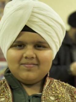 A boy in a turban during the Sikh Turban Showdown at the Sikh Foundation of Virginia in January. (source: PBS)