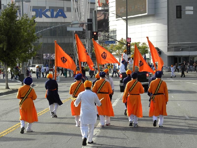 The Panj Pyare, or Five Beloved Ones, lead the Nagar Kirtan in Los Angeles, California on April 7, 2013. (source: SikhNet)