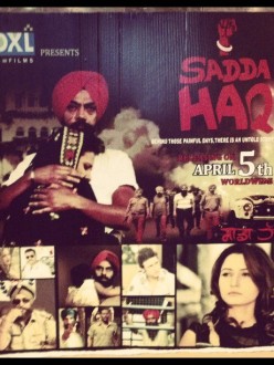 A poster for the film "Sadda Haq" at an American movie theater.