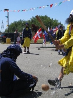"A blindfolded martial arts master splits a coconut on the head of his colleague without touching his head, an action so fast he had the club raised again before the coconut fell." (source: Jessica Skropanic | Record Searchlight)