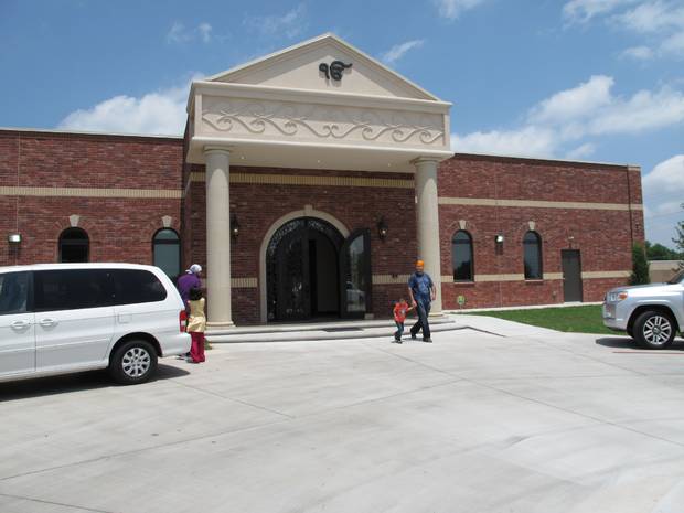 "Members of the Sikh faith community [in Oklahoma City, Oklahoma] walk outside their new gurdwara after a grand opening service and celebration May 19 at the new house of worship, 4525 NW 16." (Photo credit: Carla Hinton | The Oklahoman)