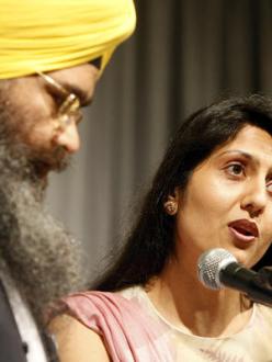 "Granthi Amarjeet Singh, left, and Tina Kaur Rekhi of the Sikh faith offer a prayer Thursday morning at the annual Community Prayer Breakfast at Century Center in South Bend sponsored by the United Religious Community." (source: South Bend Tribune)