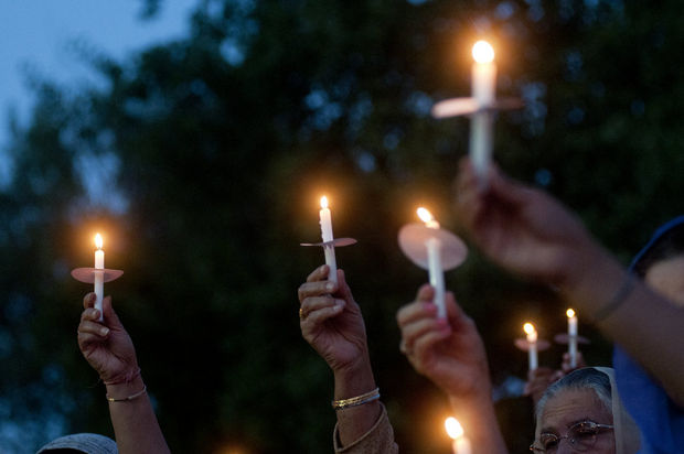 Candlelight vigil in Thomas Township, Michigan, on August 15, 2012, after the mass murder of six Sikhs in Oak Creek, Wisconsin, by a white supremacist ten days earlier. (Source: MLive)