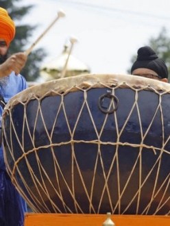"Jaljit Singh Khalsa, of Beaverton, sets the beat during the procession during annual Sikh celebration honoring Guru Arjan Dev Ji at it leaves the Dasmesh Darbar Sikh Temple, in South Salem, on Sunday, June 16, 2013." (Photo: Timothy J. Gonzalez | Statesman Journal)