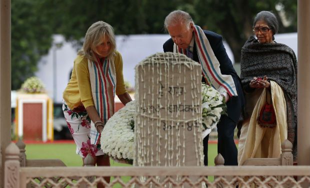 U.S. Vice President Joe Biden and his wife Jill lay a wreath at the memorial of Mahatma Gandhi in New Delhi on July 23. Gandhi's granddaughter, Tara Gandhi, is at right.  (Source: Deccan Chronicle)