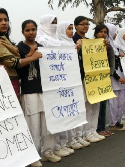Demonstrators protest against violence towards women. (Source: Washington Post)