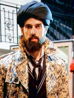 "Urban turban: A model displays a creation for the French designer Jean-Paul Gaultier." (Source: The Daily Mail)