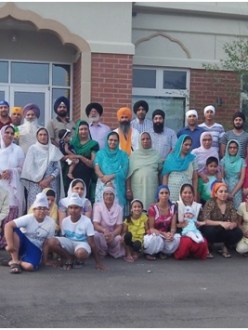 Members of the Dashmesh Sikh Gurudwara at the rose planting ceremony, August 5th, 2014 (photo by Lori Way).