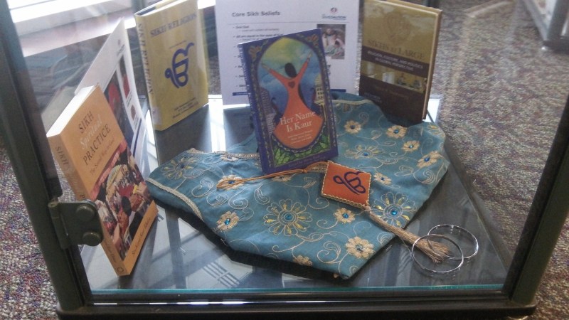 <em>Her Name Is Kaur</em> on display at the University of Saint Francis Library in Fort Wayne, Indiana. Photo by Lori Way.