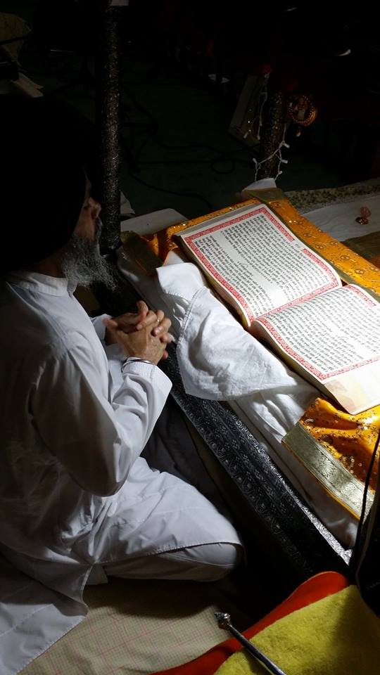 Reading from the Guru Granth Sahib at the Sikh Gurdwara of Fort Wayne in Fort Wayne, IN. Photo credit: Nicole Johnson Smith